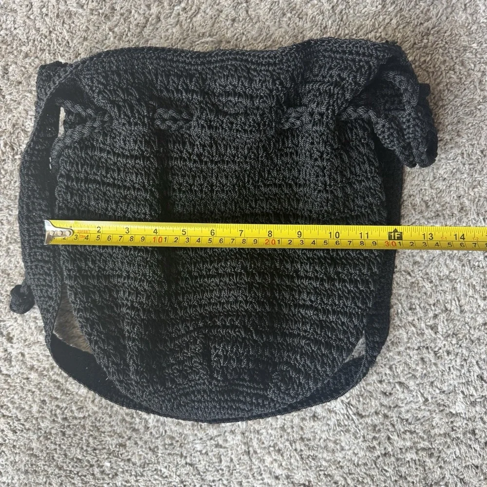 THE SAK Crochet Drawstring Purse Backpack Black Bucket Handbag Excellent